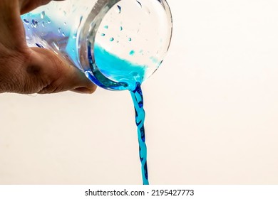 Blue Liquid Poured In The Laboratory