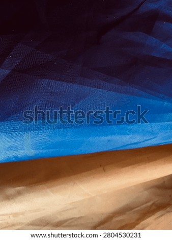 Blue Low Poly Abstract Background with Brown Geometric Landscape Texture