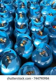 Blue LPG Or Propane Tank Under Sun Light