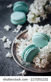 Blue Macarons With Lilacs
