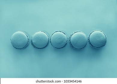 Blue Macarons Over Blue Background