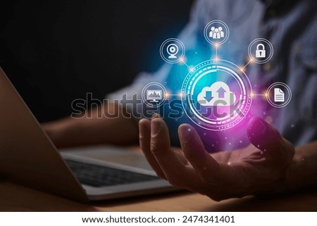 Blue Magenta Cloud Storage Network or Cloud Computing Technology Concept. Cloud,Graph,Lock,Document and HUD Icon on Business's Hand with Laptop Computer