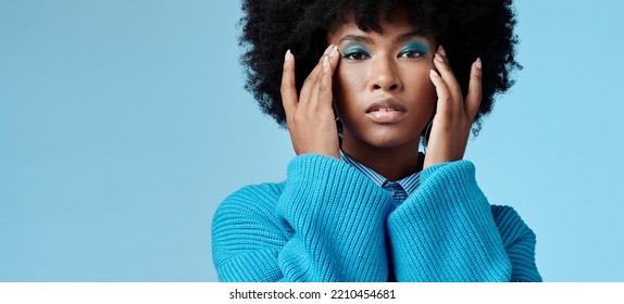 Blue Makeup, Fashion And Beauty With A Black Woman In Studio Against A Wall Background With Mockup. Cosmetics, Face And Eye Shadow With A Young Female Posing For Contemporary Or Edgy Style