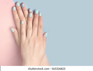 Blue Manicure On Female Hand.