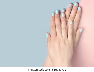 Blue Manicure On Female Hand.