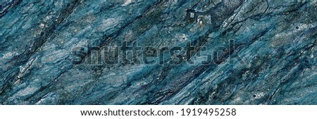Blue Marble texture background floor decorative stone interior. natural pattern of marble background, Surface rock stone with a pattern of Emperador marbel, Close up of blue abstract texture.