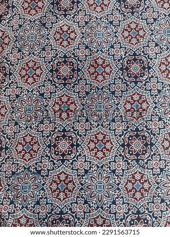 Blue and maroon traditional and intricate geometric design in ajrakh print