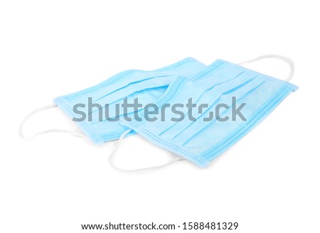 Blue medical face masks isolated on white