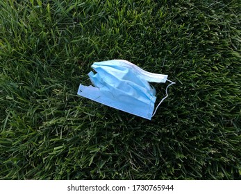 Blue Medical N95 Mask Litter Littered Mask Lying On Grass Trash Hospital Protection Shield Mask Wasted Lying On Ground Dexter Michigan