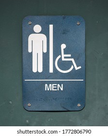 A Blue Mens Room Sign With A Handicapped Symbol