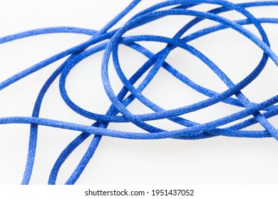 Blue Messy String, String Out Of Coil A Bit Messy; Blue String On White Background