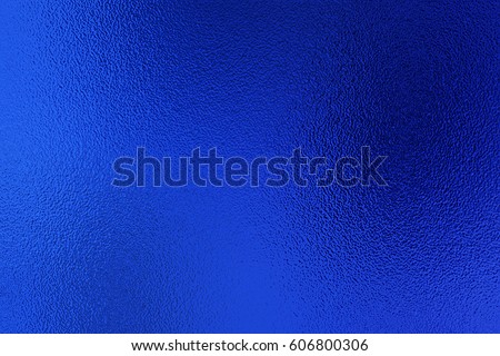 Blue metallic foil paper texture decor background. Metalized paper.