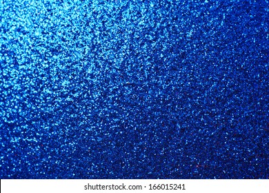 Blue Metallic Sparkling Sequin Background With Light Corner Gradient