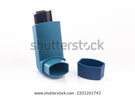 Blue Metered Dose Inhaler isolated over white background