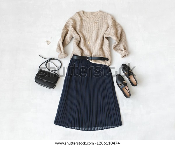 beige sweater grey skirt