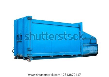 Blue mobile press container with integrated hydraulic compactor used for heavy-duty industrial waste volume reduction, isolated on white background