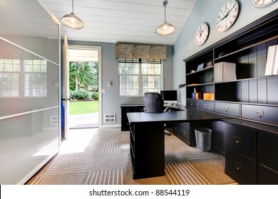 Blue Modern Home Office Interior Design With Dark Brown Furniture.