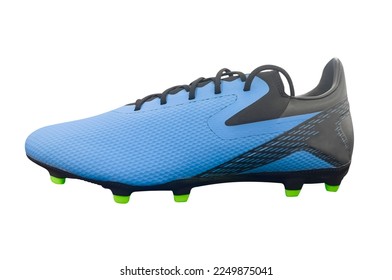 Blue modern soccer boots isolated on white background. Leather football boot isolated. Professional athletics training shoes. Sports shoes.