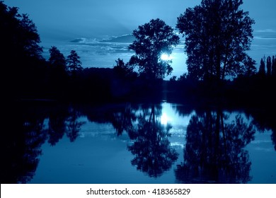 Blue Moody View On Bayou River During Late Night After Sunset