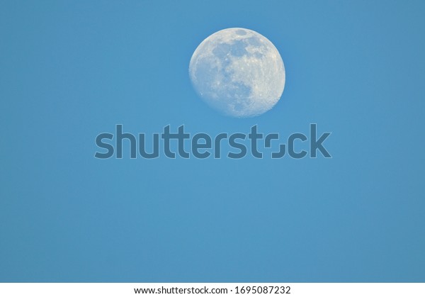 blue moon and clear\
sky
