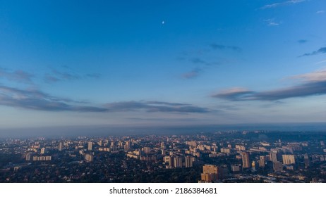 Blue morning skyscape panorama view in summer city residential district. Aerial cityscape above buildings and streets, Kharkiv Ukraine