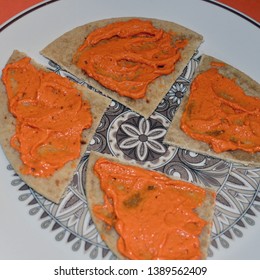 Blue Mountains, New South Wales, Australia. May 2019. Roasted Capsicum Dip On Slices Of Roti Bread.