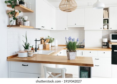 Blue Muscari Flower On White Modern Kitchen Scandinavian Style. Spring Decoration Eco Friendly Kitchen