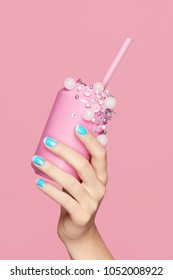 Blue Nails. Woman With Soda Can In Hands On Pink Background. Close Up Of Female Hands WIth Bright Blue Manicure Holding Pink Soda Can With Beads. Nails Design. High Quality Image.