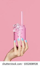 Blue Nails. Woman With Soda Can In Hands On Pink Background. Close Up Of Female Hands WIth Bright Blue Manicure Holding Pink Soda Can With Beads. Nails Design. High Quality Image.