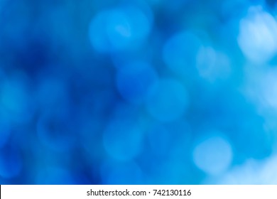 Blue Natural Background Of Out Of Focus Forest Or Bokeh