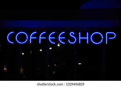 A Blue Neon Sign Of A Coffeeshop (coffee Shop) - In Amsterdam, Holland