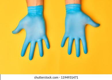 Blue Nitrile gloves. Hands of a medic in the blue latex gloves