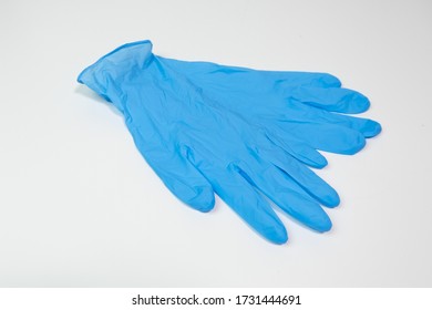 Blue Nitrile Medical Gloves On White Table