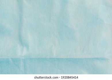 Blue Nonwoven Fabric For The Production Of Medical Clothing, Background, Texture