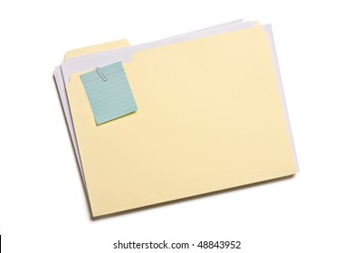 Blue Note Clipped On A File Folder Isolated On White Background.