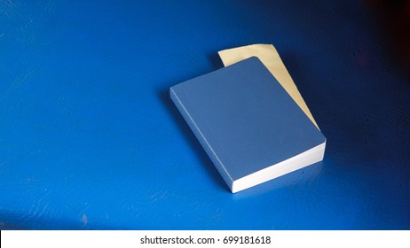 blue notebook on blue background