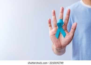 Blue November Prostate Cancer Awareness month, Man in blue shirt with Blue Ribbon for support people life and illness. Healthcare, International men, Father, Diabetes and World cancer day - Shutterstock ID 2210192749