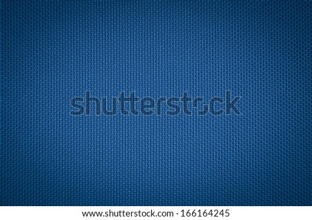 blue nylon fabric texture. coarse canvas background - closeup pattern