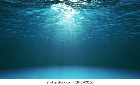 Blue ocean surface seen from underwater. Abstract waves underwater and rays of sunlight shining through water - Shutterstock ID 1845903160