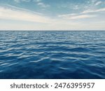 Blue Ocean, Water Surface and Blue Sky