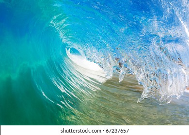 Blue Ocean Wave, View Into The Tube From Water Level