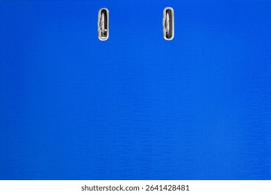 Blue office ring binder for documents and folders, office organization, empty hardcover full frame background