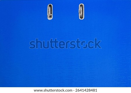 Blue office ring binder for documents and folders, office organization, empty hardcover full frame background