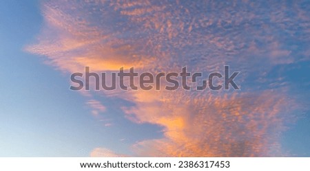 Blue and orange colour sky background of cloud formation