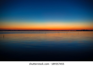 Blue And Orange Gradation Of Sunset On The Lake Kasumigaura