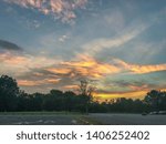 Blue and orange sunset sky in a parking lot at Algonkian park, Sterling, Loudoun County, northern Virginia