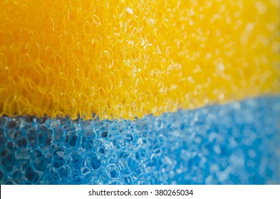 Blue And Orange Synthetic Fiber Texture. Close-up Image.