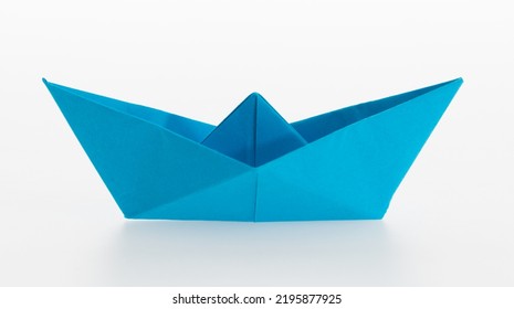 Blue Origami Boat On White Background.