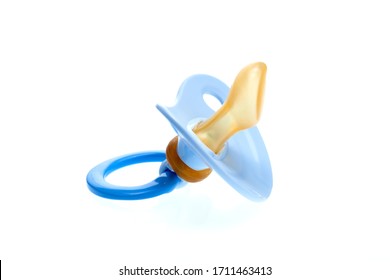 a blue pacifier for boy made of soft silicone  isolated on white background, nobody.