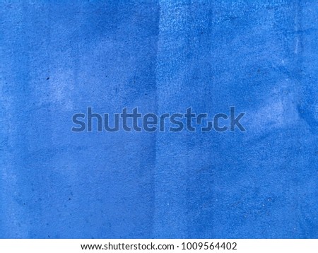 Blue paint concrete wall background and texture